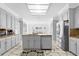 Spacious kitchen featuring an island, stainless steel appliances, and ample cabinetry at 3670 River Mansion Dr, Peachtree Corners, GA 30096