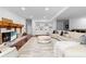 Spacious living room with hardwood floors and a brick fireplace at 3670 River Mansion Dr, Peachtree Corners, GA 30096