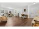 Spacious living room featuring hardwood floors, elegant decor, and ample natural light at 236 Rankin Cir, Mcdonough, GA 30253