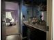 The bathroom features blue walls, decorative mirrors, and a vanity with toiletries at 3429 Lake End Dr, Loganville, GA 30052