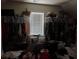 Large walk-in closet with seating area at 3429 Lake End Dr, Loganville, GA 30052