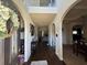 Spacious foyer with hardwood floors, arched doorways, and a view of the home's open layout at 3429 Lake End Dr, Loganville, GA 30052
