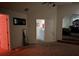 View of the carpeted living room with an archway and a view to another room at 3429 Lake End Dr, Loganville, GA 30052