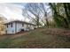 Expansive backyard featuring a well-maintained lawn, complementing the home's exterior at 2895 Akron St, Atlanta, GA 30344