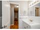 Bathroom with classic fixtures and a view down the hallway at 2895 Akron St, Atlanta, GA 30344