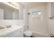 Bathroom featuring white tile, classic fixtures, and bathtub at 2895 Akron St, Atlanta, GA 30344