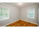 Simple, clean bedroom with hardwood flooring and plenty of natural light at 2895 Akron St, Atlanta, GA 30344