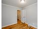 Bedroom featuring hardwood floors and a view into the hall at 2895 Akron St, Atlanta, GA 30344