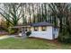 Beautifully renovated home featuring new paint, complementary shutters and a well-manicured lawn at 2895 Akron St, Atlanta, GA 30344