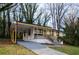 A cozy single-Gathering home with a convenient carport and inviting front porch at 2895 Akron St, Atlanta, GA 30344