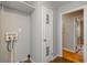 Clean laundry area with washer and dryer hookups and functional shelving at 2895 Akron St, Atlanta, GA 30344