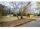 Charming home with a well-manicured front lawn and inviting curb appeal in a friendly neighborhood at 2895 Akron St, Atlanta, GA 30344