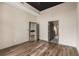 Empty bedroom showcasing a bed, stylish decor, and convenient access to the en-suite bathroom and walk-in closet at 3400 Malone Dr # 303, Atlanta, GA 30341