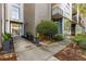 Inviting building entrance with well-manicured landscaping and a clear view of the unit number at 3400 Malone Dr # 303, Atlanta, GA 30341