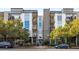 Modern condo building exterior with a symmetrical design, large windows, and well-maintained landscaping at 3400 Malone Dr # 303, Atlanta, GA 30341