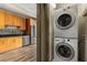Efficient laundry area with a stacked washer and dryer, conveniently located next to the modern kitchen at 3400 Malone Dr # 303, Atlanta, GA 30341