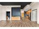 Expansive open-concept layout with stainless steel appliances, dark accents and sleek flooring at 3400 Malone Dr # 303, Atlanta, GA 30341
