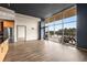 Bright living area with large windows and wood floors; features dining area and a modern open floor plan at 3400 Malone Dr # 303, Atlanta, GA 30341