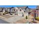 Traditional two-story brick home with attached two-car garage and long driveway at 3488 In Bloom Way, Auburn, GA 30011