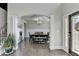 Inviting foyer featuring hardwood floors and a view of the dining area at 3488 In Bloom Way, Auburn, GA 30011