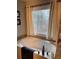 Bathtub with a view of the trees in the yard through the window at 911 Laurel Crest Dr, Woodstock, GA 30189