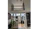 Bright foyer with high ceilings, hardwood floors, and a view of the front door at 911 Laurel Crest Dr, Woodstock, GA 30189