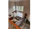 Open concept living room with high ceilings, large windows, and comfortable seating at 911 Laurel Crest Dr, Woodstock, GA 30189