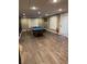Recreation Room featuring recessed lights, laminate floors, and a pool table at 911 Laurel Crest Dr, Woodstock, GA 30189