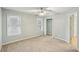 Comfortable bedroom with neutral carpet and windows at 3815 Glen Laurel Ct, Cumming, GA 30040