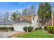 Inviting two-story home with well-manicured lawn and attached garage at 3815 Glen Laurel Ct, Cumming, GA 30040