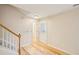 Bright hallway with wood-look floors and a decorative front door at 3815 Glen Laurel Ct, Cumming, GA 30040