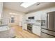 Kitchen featuring stainless steel appliances, granite countertops, subway tile backsplash and eat in area with lots of natural light at 3815 Glen Laurel Ct, Cumming, GA 30040