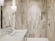 Stylish bathroom with a sleek shower featuring a built-in niche and modern fixtures at 114 Terrace Ne Dr, Atlanta, GA 30305