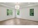 Bright and airy bedroom with hardwood floors and large windows at 114 Terrace Ne Dr, Atlanta, GA 30305
