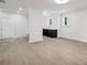 Bonus room with a beverage center, white trim, and hardwood floors at 114 Terrace Ne Dr, Atlanta, GA 30305