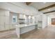 Kitchen with a large island, marble countertops, stainless steel appliances, and ample cabinet space at 114 Terrace Ne Dr, Atlanta, GA 30305