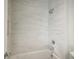 A simple, white tiled shower with modern fixture at 114 Terrace Ne Dr, Atlanta, GA 30305