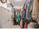 Spacious walk-in closet with organized storage and ample hanging space, perfect for wardrobe management at 128 Holly Pl, Canton, GA 30115