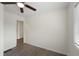 Bright bedroom features wood-look flooring, neutral paint and ample natural light coming in through the window at 17 Turman #4 Se Ave, Atlanta, GA 30315