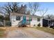 Charming single-story home featuring a blue front door and well-maintained landscaping at 17 Turman #4 Se Ave, Atlanta, GA 30315