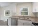 Modern kitchen features stainless steel appliances and stone countertops at 17 Turman #4 Se Ave, Atlanta, GA 30315