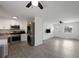 Open kitchen with stainless appliances, eat-in counter, and washer/dryer combo at 17 Turman #4 Se Ave, Atlanta, GA 30315