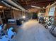 Expansive unfinished basement featuring utilities, lighting and exposed structural elements at 25 Clay Ct, Hiram, GA 30141