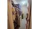 Walk-in closet featuring ample hanging space, shelving, and storage solutions at 25 Clay Ct, Hiram, GA 30141