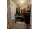 Walk-in closet with wire shelving for ample storage, including space for bins and suitcases at 25 Clay Ct, Hiram, GA 30141