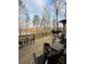 Spacious wooden deck features outdoor furniture and offers scenic views of the lake at 25 Clay Ct, Hiram, GA 30141