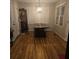 Dining room features traditional table and bench and ample natural light at 25 Clay Ct, Hiram, GA 30141