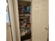 Organized linen closet with plenty of shelving for storing towels and bedding at 25 Clay Ct, Hiram, GA 30141