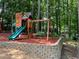 Fun backyard playground with slide, climbing features, and swing set for  at 25 Clay Ct, Hiram, GA 30141