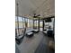 Comfortable screened porch featuring stylish furniture, a ceiling fan, and a view of the lake at 25 Clay Ct, Hiram, GA 30141